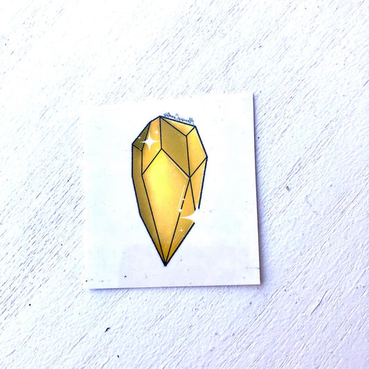 Yellow Gem Tattoo